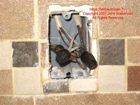 electrical box pulled out of outside wall wall|electrical box screw hole broken.